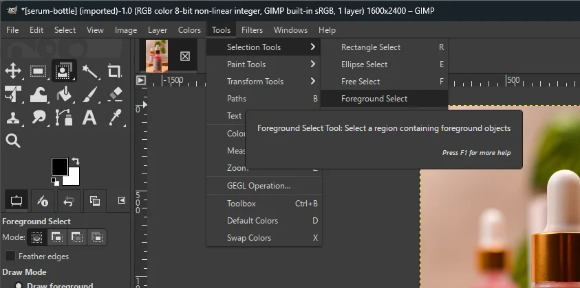 The GIMP Tools menu open at Selection Tools, with Foreground Select highlighted and its tooltip showing