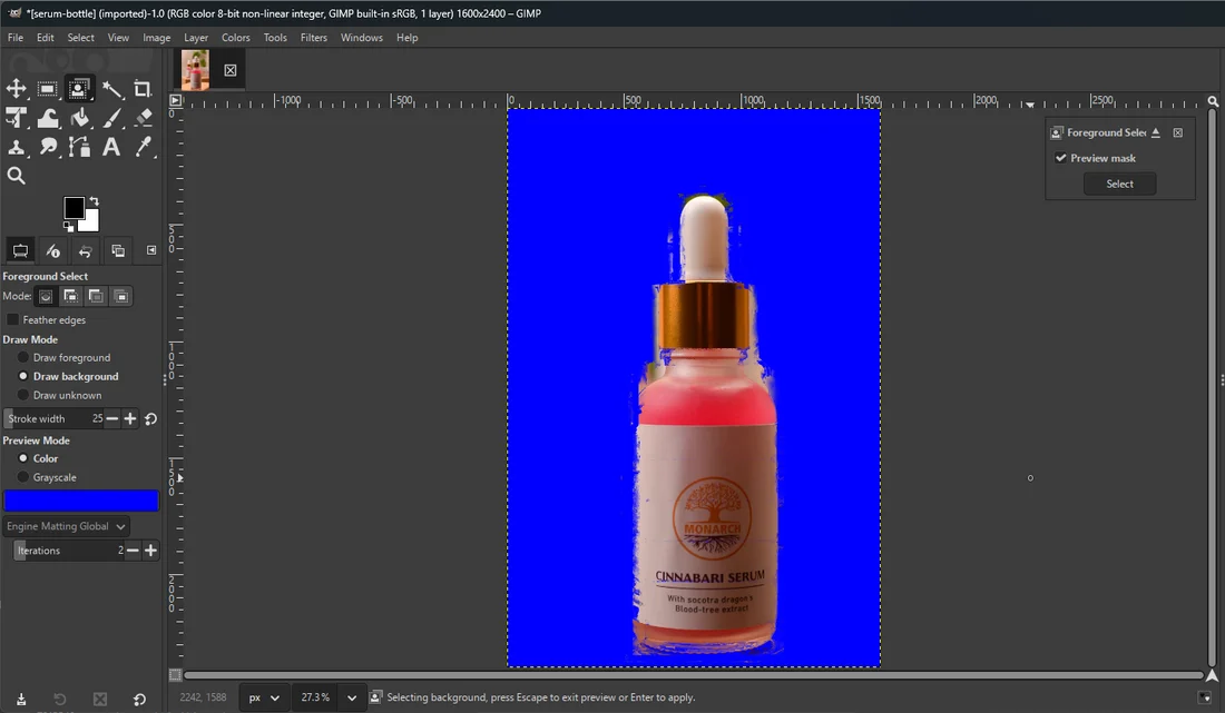 The GIMP Foreground Select preview: the whole bottle clear with clean sides, the background tinted blue