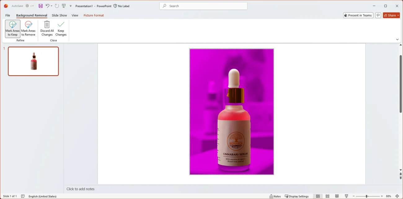 PowerPoint Background Removal view after marking: the whole front bottle in colour, dropper and base included, and everything else magenta